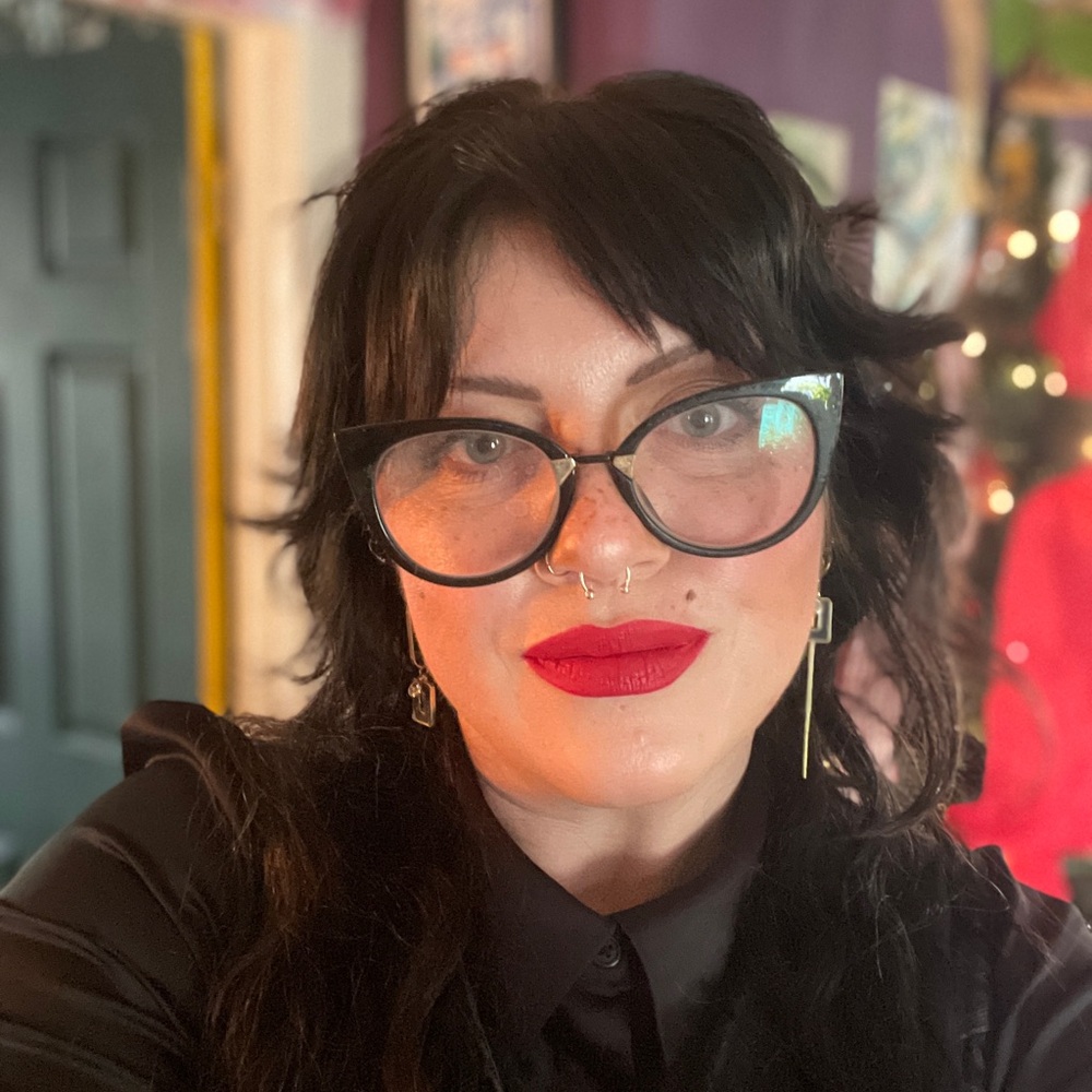 Black and gold cat eye glasses